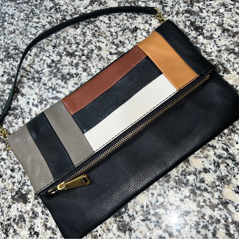 Super Cute Multi Color Leather Clutch 

Fossil Brand 

Smoke & Pet Free Home